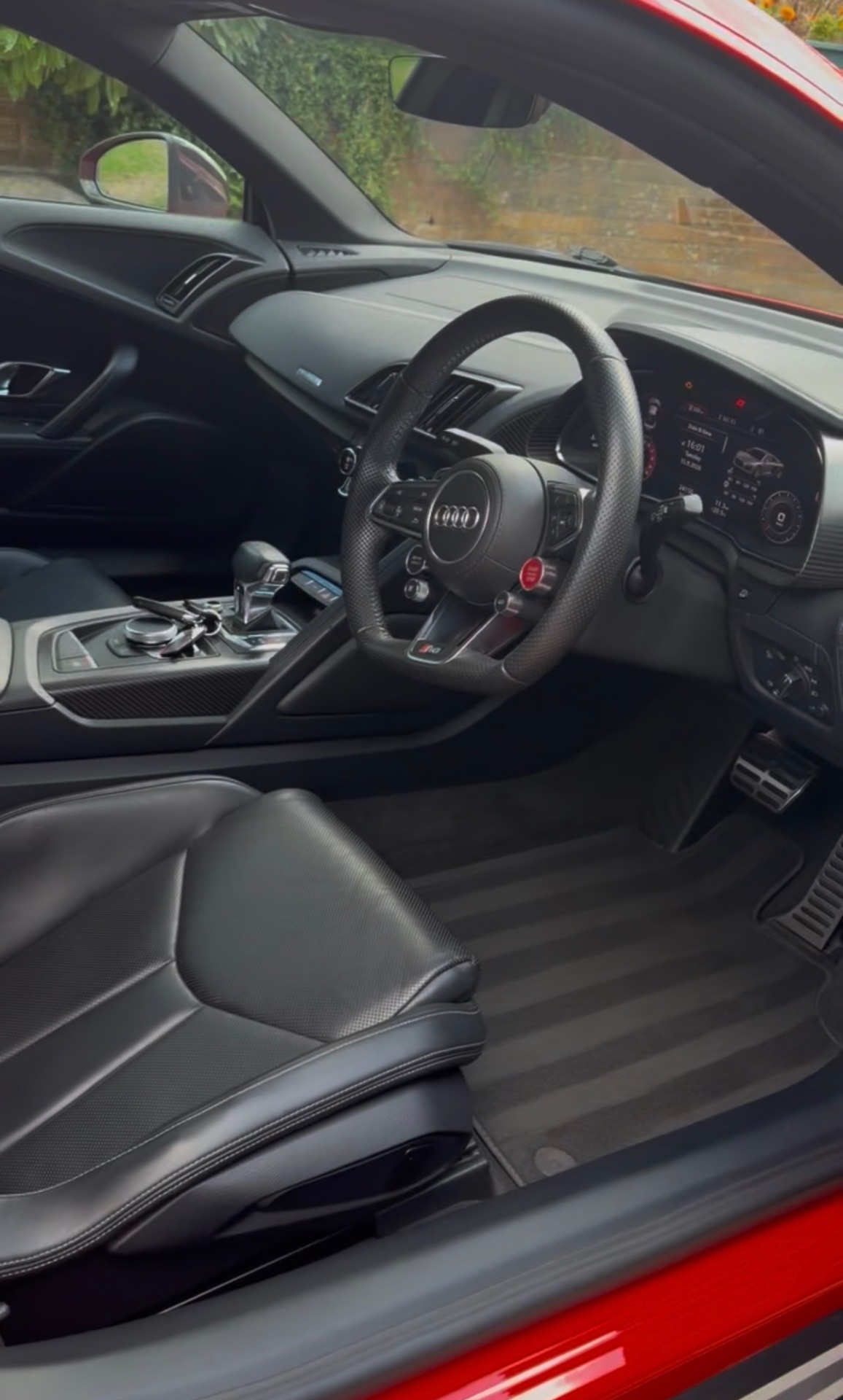 Detailed Audi interior with clean seats, dashboard and carpets