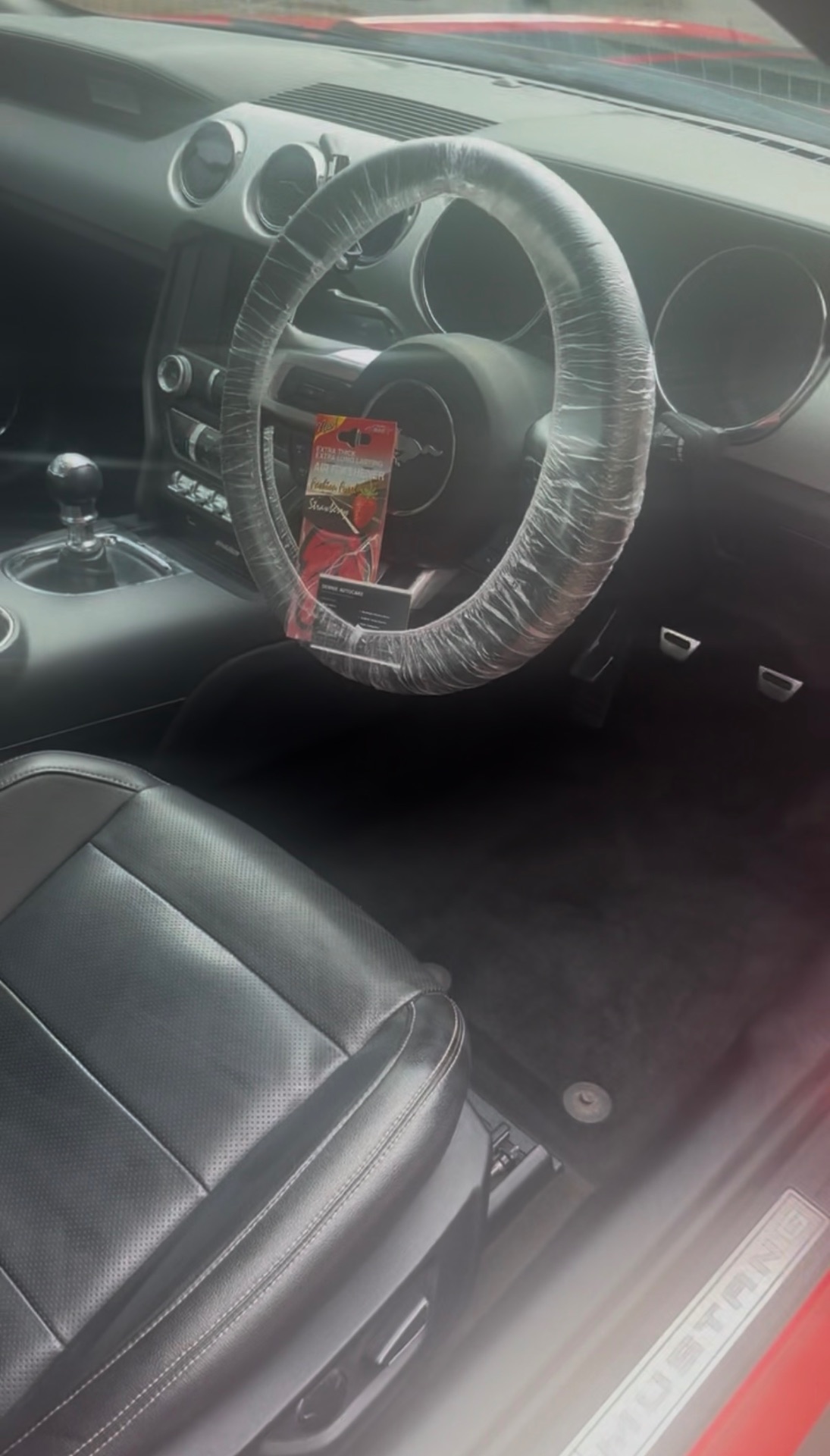 Deep-cleaned Ford Mustang interior and driver's seat
