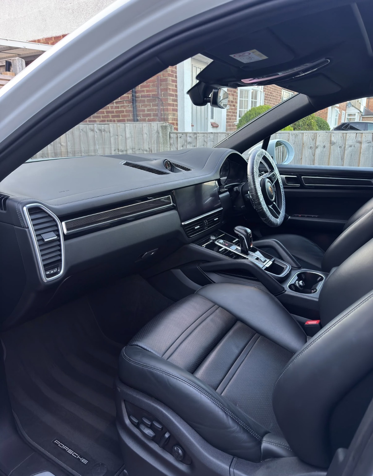 Deep-cleaned Porsche interior with spotless leather and carpets